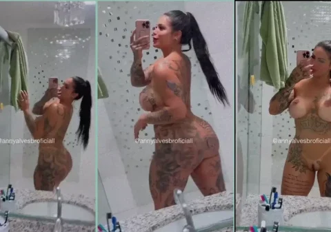 Morena tatuada de São paulo mostrando sua beleza sensual em frente ao espelho