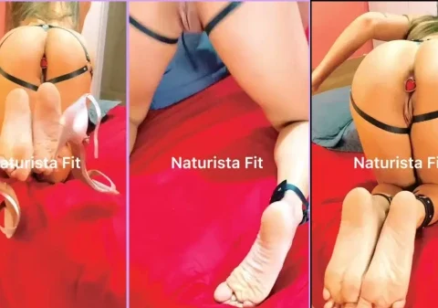 Safada de quatro com um plug anal socado no cu
