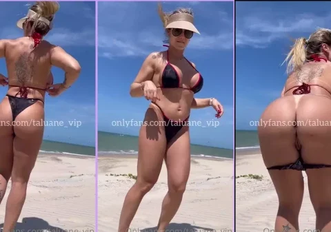Safada na praia mostrando a sua bucetinha deliciosa