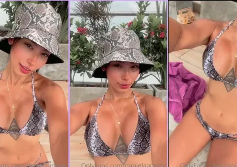 Colombiana muito linda exibindo o seu novo biquíni na piscina