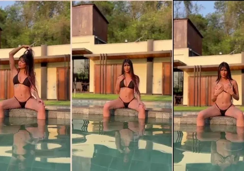 Morena super fogosa se exibindo só de biquíni na piscina